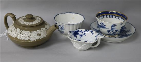 A late 18th century blue and white porcelain pickle dish, two blue and white teabowls, a saucer and a pottery teapot